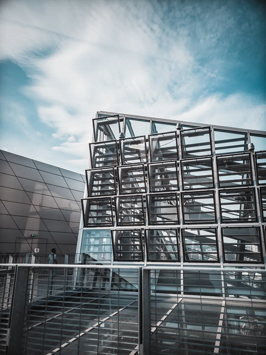 grey-concrete-building-with-multiple-windows copy